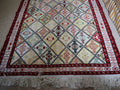 Angled view showing cotton fringe and full diamond field pattern